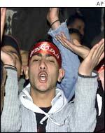 Palestinians demonstrating in a refugee camp in Syria