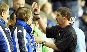 Blackburn boss Graeme Souness (out of view) is sent from the touchline by referee Andy D'urso