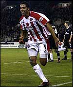 Carl Asaba of Sheffield United celebrates scoring 