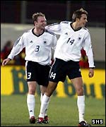 Alexander Voigt (left) scored Germany's late equaliser