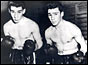 Ronnie and Reggie Kray in boxing outfits