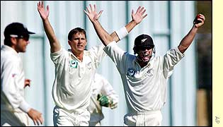Shane Bond and Mark Richardson appeal for the wicket of Indian opener Virender Sehwag