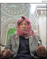 Iraqi man during Friday prayer