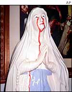 Italian statue of bleeding virgin AP