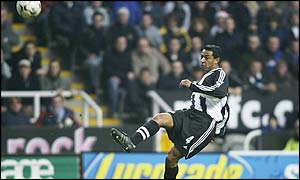 Nolberto Solano scores the first Premiership goal of the day for Newcastle