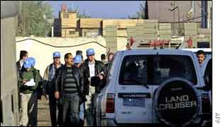 Inspectors leaving a facility