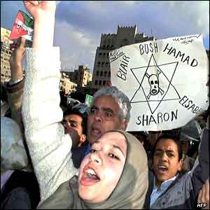 Protesters outside the Qatari embassy in Cairo