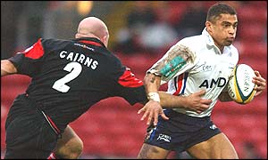 Jason Robinson of Sale attacks against Saracens