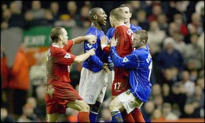 Everton's Kevin Campbell confronts Steven Gerrard after his tackle on Gary Naysmith
