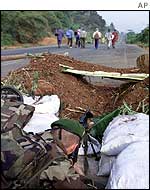 French soldier watches refugees outside Duekoue