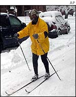A man skis down a street in Wilkes-Barre, Pennsylvania