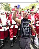 Chavez supporters march through Caracas