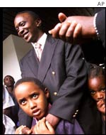 Uhuru Kenyatta and his son Muho on the campaign trail 