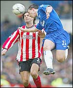 Chelsea's John Terry and Southampton's Jo Tessem challenge