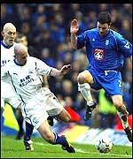 Kenna leaps as Carsley dives in