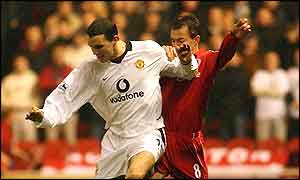 John O'Shea holds off Szilard Nemeth