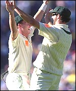 Jason Gillespie celebrates with Andy Bichel