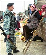 Russian soldier at market in Znamenskoye