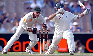 Australian keeper Adam Gilchrist attempts to stump England skipper Nasser Hussain