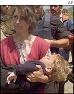 Ethnic Albanian woman fleeing Kosovo