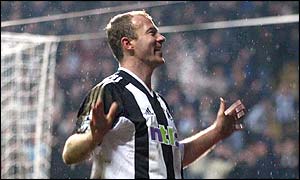 Alan Shearer celebrates after scoring Newcastle's second goal in the 58th minute