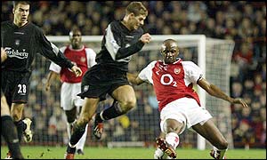 Gerrard is stopped in his tracks by Arsenal's Patrick Vieira