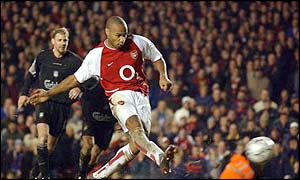 Thierry Henry scores from the spot after 79 minutes to level the match