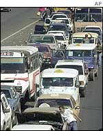 Cars queuing for petrol
