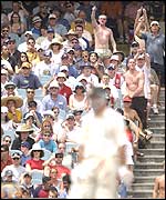 The crowd gives a motionless Waugh his marching orders