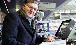 Rugby commentator Bill McLaren behind the microphone 