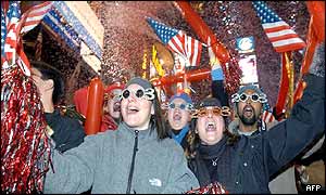 Partygoers celebrate the arrival of 2003 in New York's Time Square