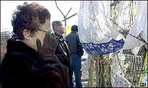 A South Korean woman weeps for relatives on the other side of the border
