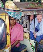 Baby-taxi carrying tourists in Dhaka