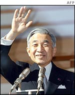 Japan's Emperor Akihito waves to well wishers