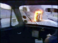 Taxi driving BBC camera crew through the streets