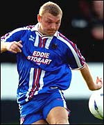 Mick Galloway in action for Carlisle