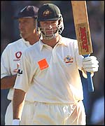 Waugh celebrates his 10,000th Test run