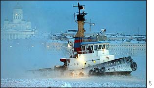 A tug breaks ice in Helsinki harbour