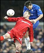 Dean Windass (in red) challenges John Terry