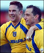 Lee Mills celebrates his goal with Dean Holdsworth