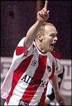 Danny Carroll celebrates his winner