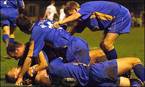 Nigel Jemson is at the bottom of the pile after scoring the winner against Everton