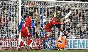 Middlesbrough striker Dean Windass and Chelsea goalkeeper Carlo Cudicini clash in the goalmouth
