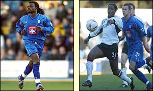 Ferdinand Coly runs during his debut for Birmingham and Louis Saha shields the ball