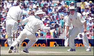 England wicket-keeper Alec Stewart makes the catch that dismisses Damien Martyn for 21 off the bowling of Richard Dawson