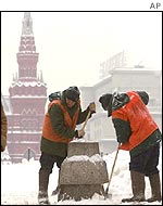 Municipal workers clean the Red Square in Moscow