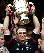 Former South Africa captain Francois Pienaar lifts the Tetley Cup in 1998