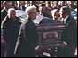 Carlo Gambino's coffin is carried into the church