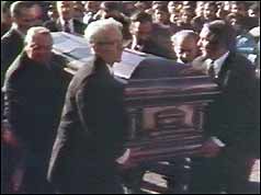 Carlo Gambino's coffin is carried into the church