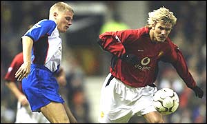 James McEveley is beaten by David Beckham's control of the ball on his knee